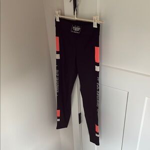 Black and Orange P.E. Nation Barry’s Bootcamp Leggings